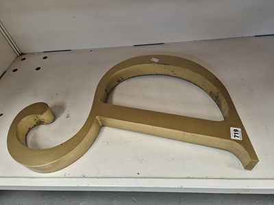 Lot 719 - A gold painted sign letter