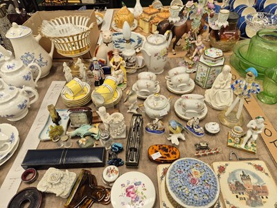 Lot 761 - A 19th century porcelain candlabra, a...