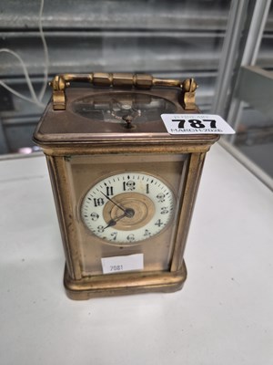 Lot 787 - A brass carriage clock with strike repeat