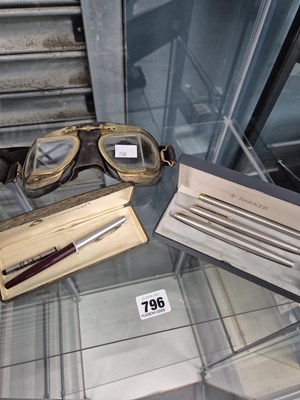 Lot 796 - Boxed Parker pens and a set of flying goggles