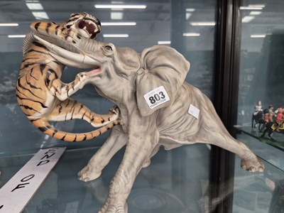 Lot 803 - A large porcelain figure of an elephant...