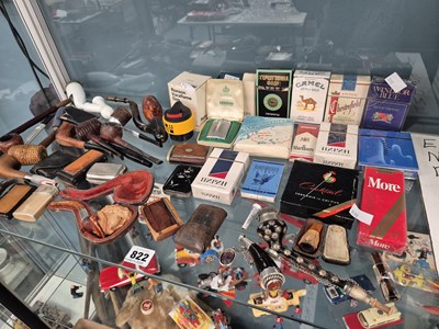 Lot 822 - A collection of smoking pipes and other...