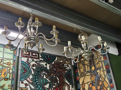 Lot 400 - A pair of silver plated eight branch chandelier