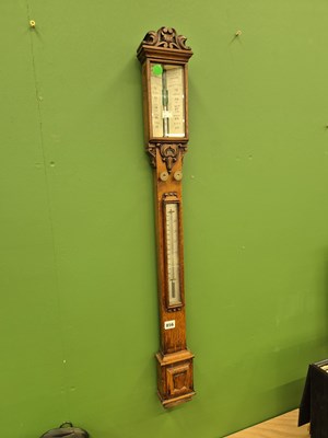 Lot 856 - A Victorian oak cased stick barometer