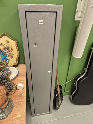 Lot 860 - A steel gun cabinet