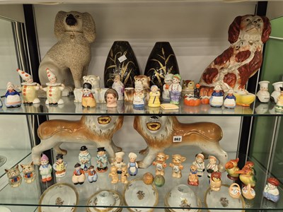 Lot 862 - A pair of Staffordshire lions, two...