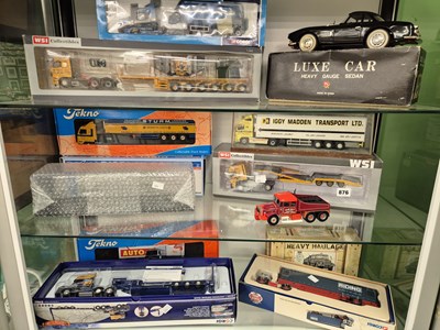 Lot 876 - A group of large-scale die-cast model trucks,...