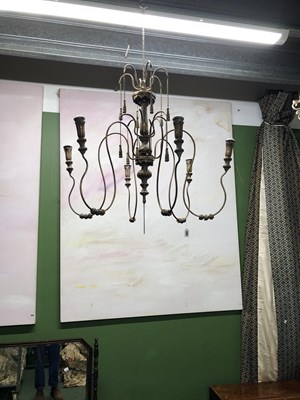 Lot 896 - A wrought metal six-arm eastern-style chandelier