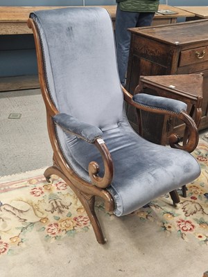 Lot 1254 - A Victorian rosewood low armchair in the...