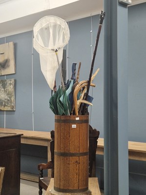 Lot 1225 - An early 20th century coopered oak stick stand...