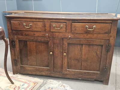 Lot 1226 - An 18th-century oak small dresser with three...