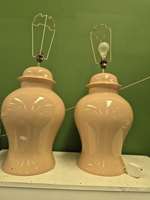 Lot 876a - Two large peach table lamps