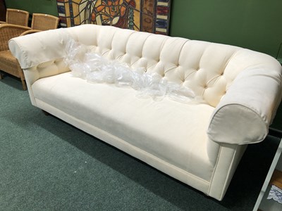 Lot 394a - A cream coloured chesterfield style settee 204...