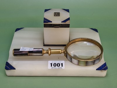 Lot 1001 - An Asprey's white onyx and lapis lazuli...