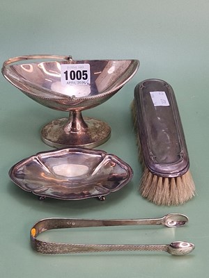 Lot 1005 - A silver backed clothes brush, a Sheffield...