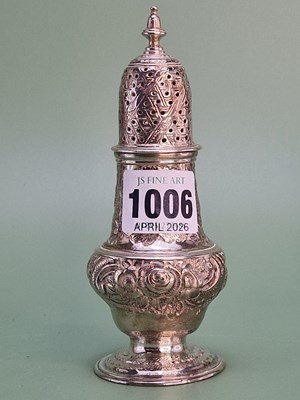 Lot 1006 - A floral embossed silver caster by John...