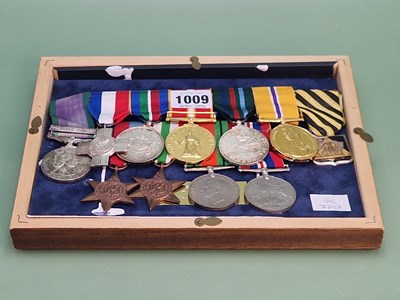 Lot 1009 - An Elizabeth II seven medal Royal Naval group...