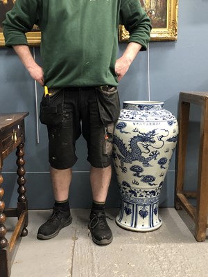 Lot 1014 - A pair of Chinese blue and white vases, each...