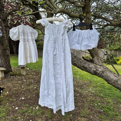 Lot 53 - An antique christening gown with lace detail,...