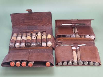 Lot 63 - Two early 20th-century leather-cased...