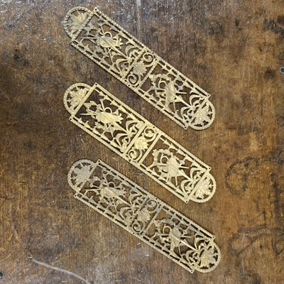 Lot 68 - A set of three decorative brass finger plates...