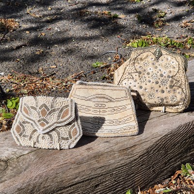 Lot 76 - Three vintage evening bags, each carrying its...