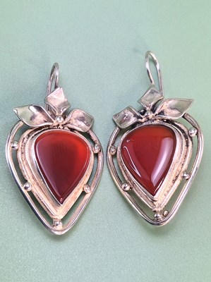 Lot 93 - Silver drop earrings in an openwork design...