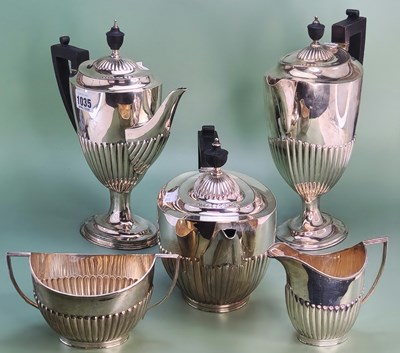 Lot 1035 - A silver tea pot by the Goldsmith's and...