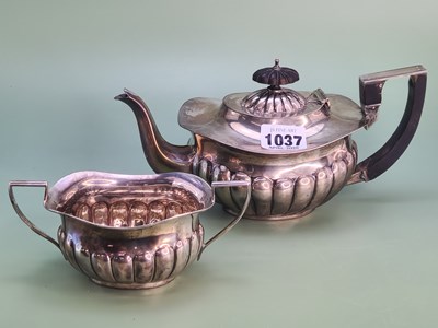 Lot 1037 - A silver bachelor's tea pot and a matching...