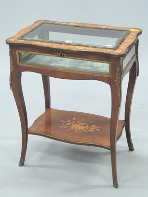 Lot 1042 - A late 19th century French floral marquetried...