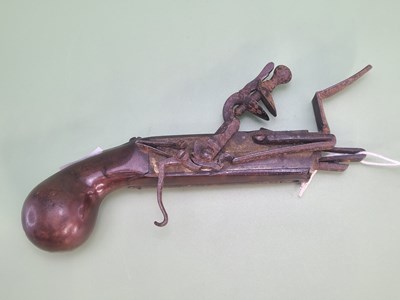 Lot 1044 - A flintlock tinder lighter