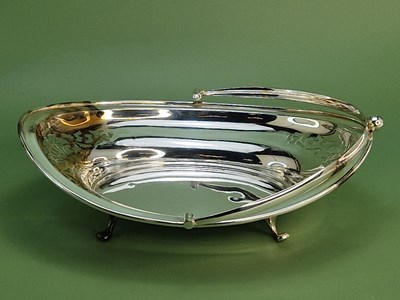 Lot 1050 - A Graham & Morton sterling silver cake basket...
