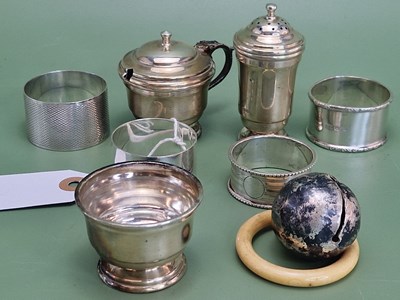 Lot 1054 - A Birmingham silver child's rattle, four...