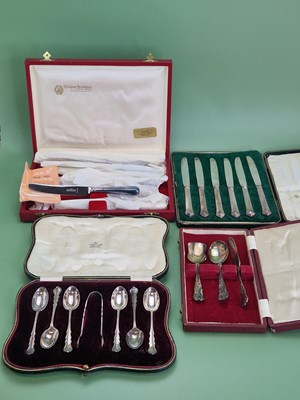 Lot 1055 - A set of six silver tea spoons cased together...