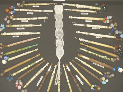 Lot 1062 - A framed display of named and other bone and...