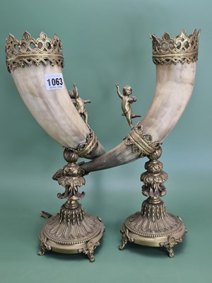 Lot 1063 - A pair of late Victorian ormolu mounted horn...