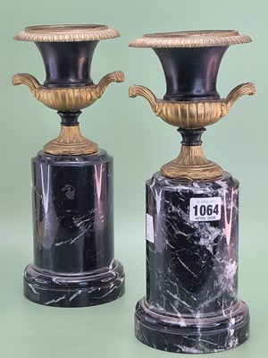Lot 1064 - A pair of early 20th century parcel gilt...