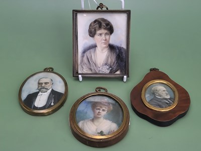Lot 1100 - Four early 20th century portrait miniatures,...