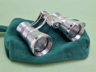 Lot 1306 - A green velvet cased pair of Rolex opera...