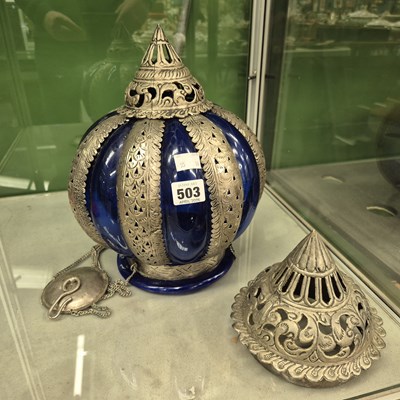 Lot 503 - An Islamic aluminium mounted blue glass...