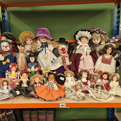 Lot 507 - A collection of costume and other dolls
