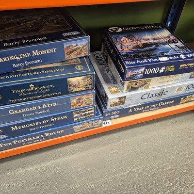 Lot 511 - Nine boxes of jigsaw puzzles