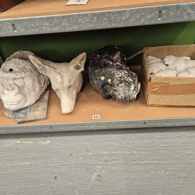Lot 517 - Three plaster animal heads together with...