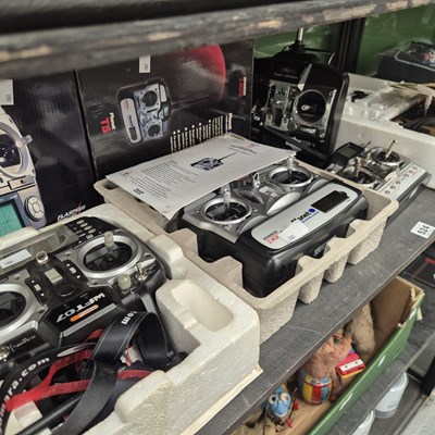 Lot 524 - Five digital remote control systems by Futaba,...