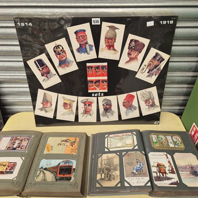 Lot 535 - Two albums of early 20th century postcards...