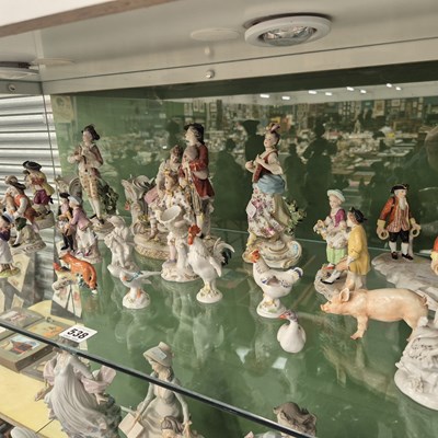 Lot 538 - A collection of German porcelain human and...