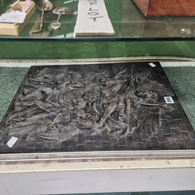 Lot 542 - A bronzed composition plaque with Roman...