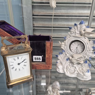 Lot 555 - A leather cased carriage timepiece together...