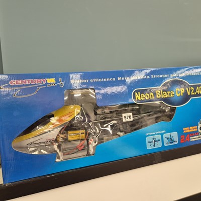 Lot 570 - A boxed Neon Blaze battery operated helicopter...
