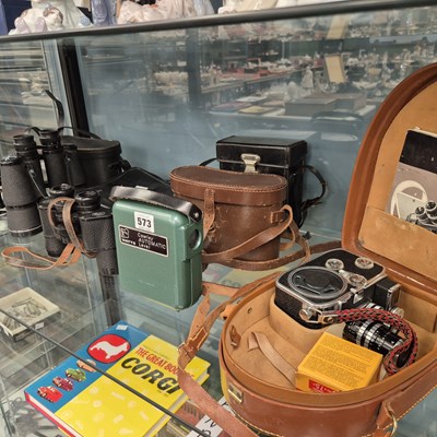 Lot 573 - A leather cased Bolex cine camera, four cases...